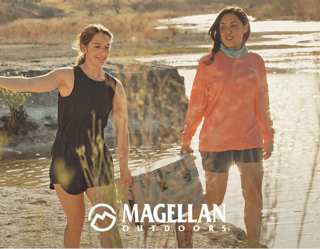 Women walking near water wearing Magellan Outdoors clothing.