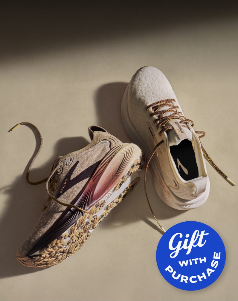 Pair of Brooks Untamed running shoes with patterned fabric and textured soles on a neutral background.