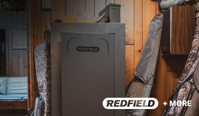 Large gun safe displayed indoors with text “Up to $300 Off Safes.” Shop Now call-to-action shown.