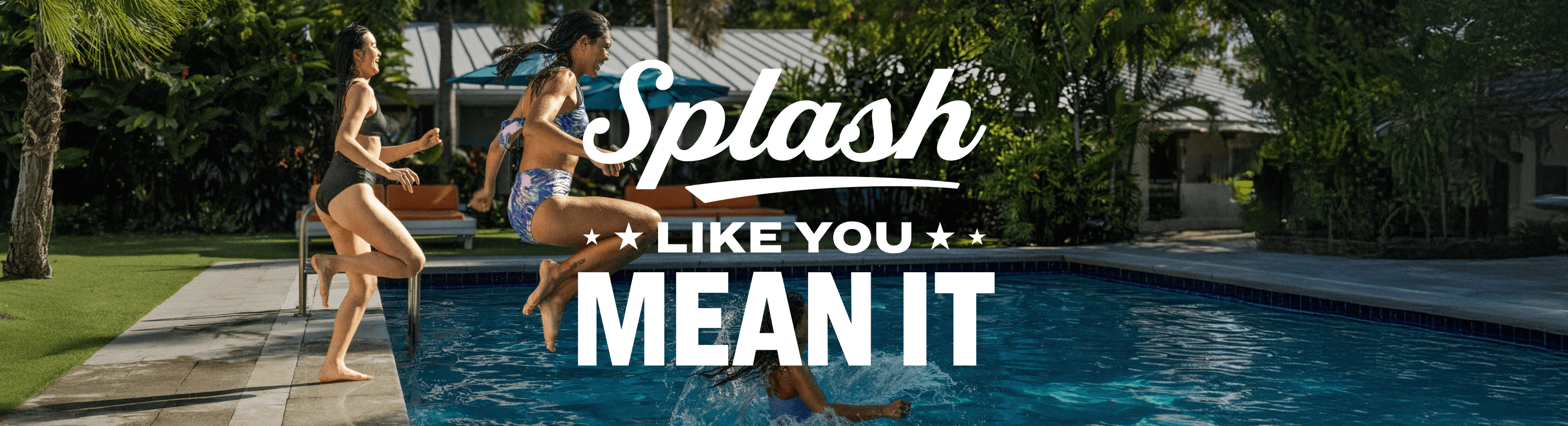 Three people running and jumping into a backyard swimming pool surrounded by palm trees, with the bold text ‘Splash Like You Mean It’ overlaid at the center.