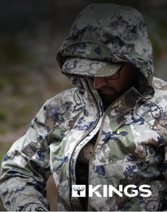 Hunter wearing camouflage apparel. Kings logo displayed at the bottom of the image.
