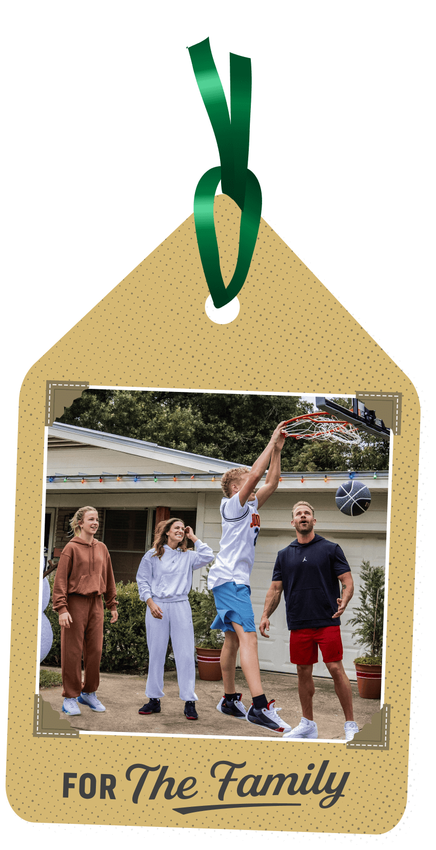 A family playing basketball together, representing gifts for the family.