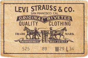 Levi Strauss & Co. leather patch showing the classic two-horse logo, product details, and stitched border on blue denim.