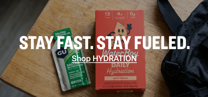 Assorted hydration and energy products including drink mix packets and a red hydration box with the text Stay Fast. Stay Fueled. Shop Now