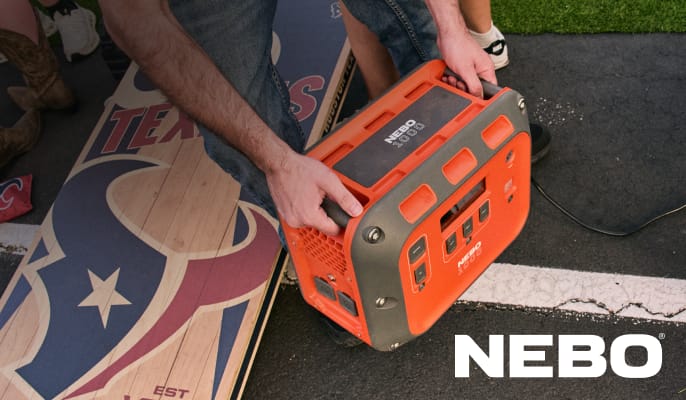 Portable NEBO power station placed on a tailgating surface.