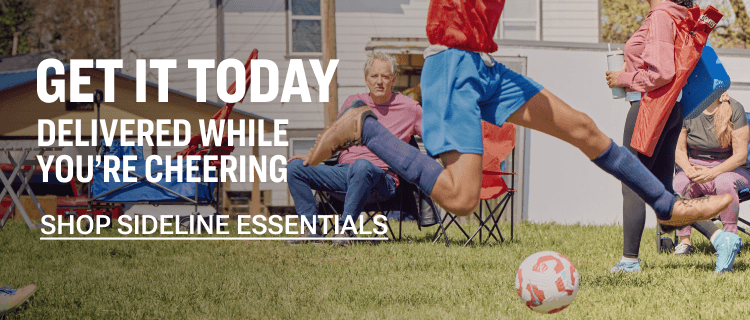 Outdoor sideline scene with folding chairs and athletes in motion on a grassy field with the text On the sideline or in the stands—we've got you. Shop same day delivery