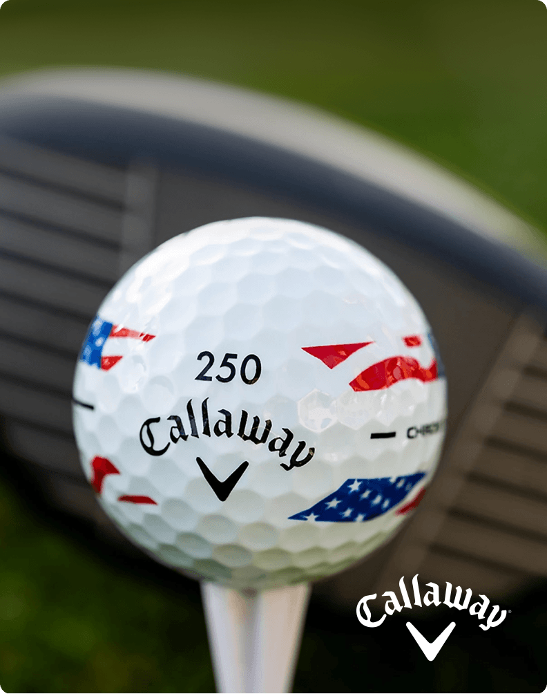 Close-up of a golf ball on a tee with patriotic accents and 250 Callaway branding.