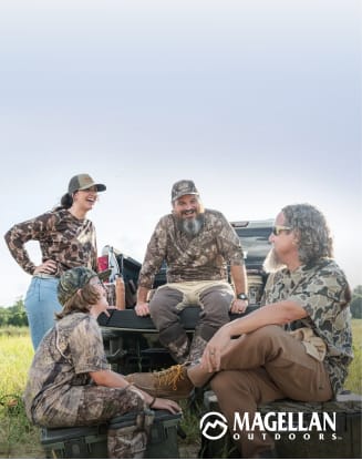 Group of hunters wearing camouflage clothing gathered outdoors near an ATV for a dove hunt. Magellan Outdoors logo displayed.