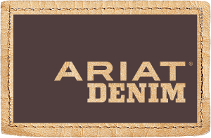 Ariat Denim leather patch with stitched border on blue denim fabric.