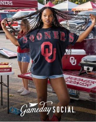 Person wearing an Oklahoma Sooners shirt standing in a tailgating area. Gameday Social logo displayed.