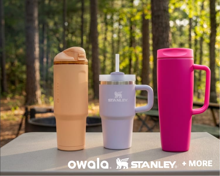 Orange, lavender and bright pink insulated tumblers from top brands like HydroJug, Stanley, and owala displayed outdoors.