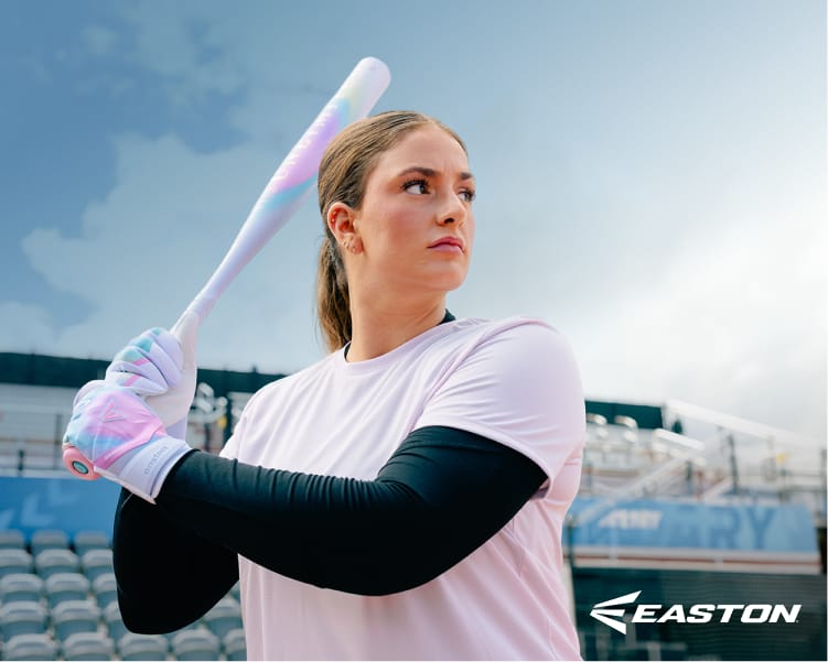Softball player holding an Easton fastpitch bat in a stadium setting. Easton logo appears in the lower-right corner.