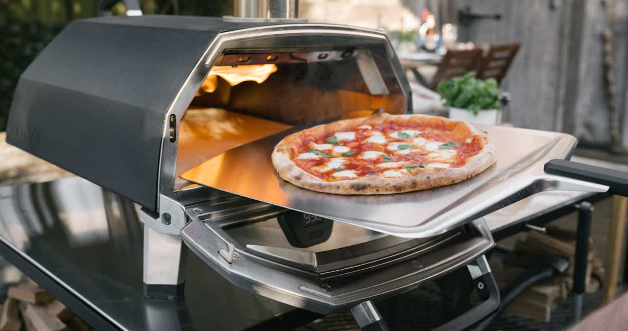 Margherita pizza pulled fresh out of the Ooni Karu portable pizza oven.