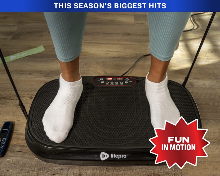 Person standing on a vibration plate fitness machine with digital display with overlaid badge "Fun In Motion."