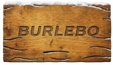 Under Armour logo carved into a weathered wooden surface topped with snow.
