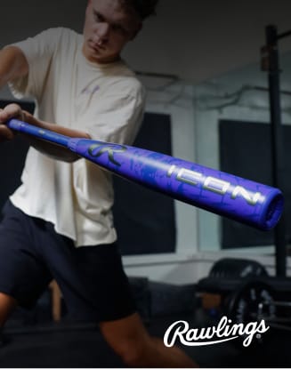 Baseball player holding a blue Rawlings ICON bat. Rawlings logo appears in the lower-right corner.