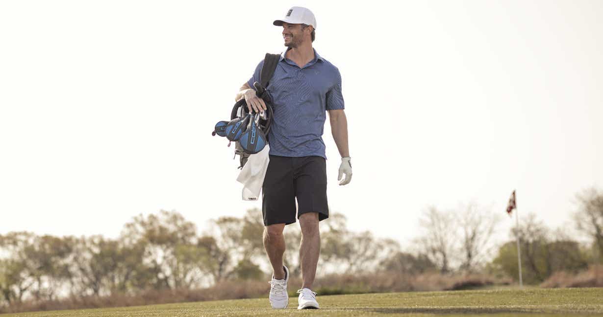 Man walking through a golf course