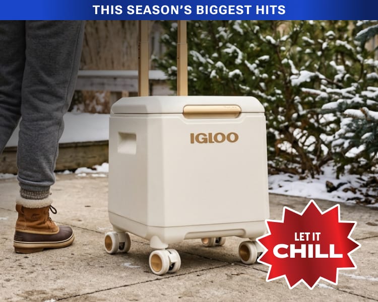 Igloo rolling cooler with wheels positioned outdoors with overlaid badge "Let It Chill."