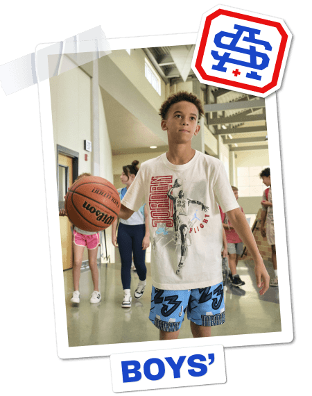 Boys’ back-to-school category banner featuring boys playing outdoors and doing a handstand in a school gym.