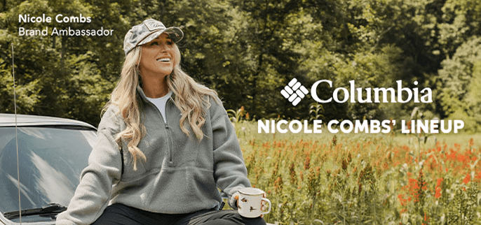 Promotional banner for Columbia Nicole Combs’ Lineup. Person wearing a gray fleece pullover and camouflage trucker cap stands beside a blue pickup truck in a grassy field with trees in the background. Visible text reads 'Nicole Combs Brand Ambassador,' the Columbia logo, and 'NICOLE COMBS’ LINEUP.'