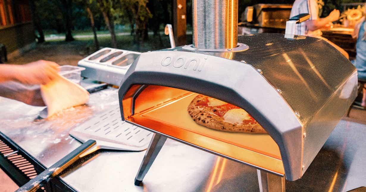 Pizza cooking to perfection in a portable pizza oven