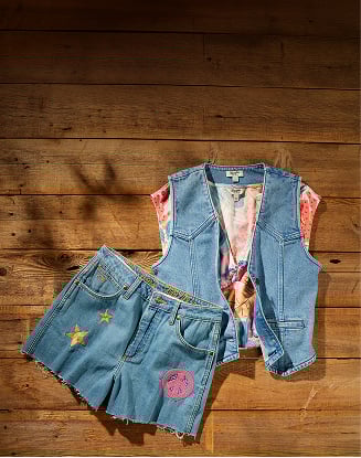 Promotional banner with denim-textured background and the text 'Get Ready to Rodeo' and 'Shop Now' in bold blue lettering.