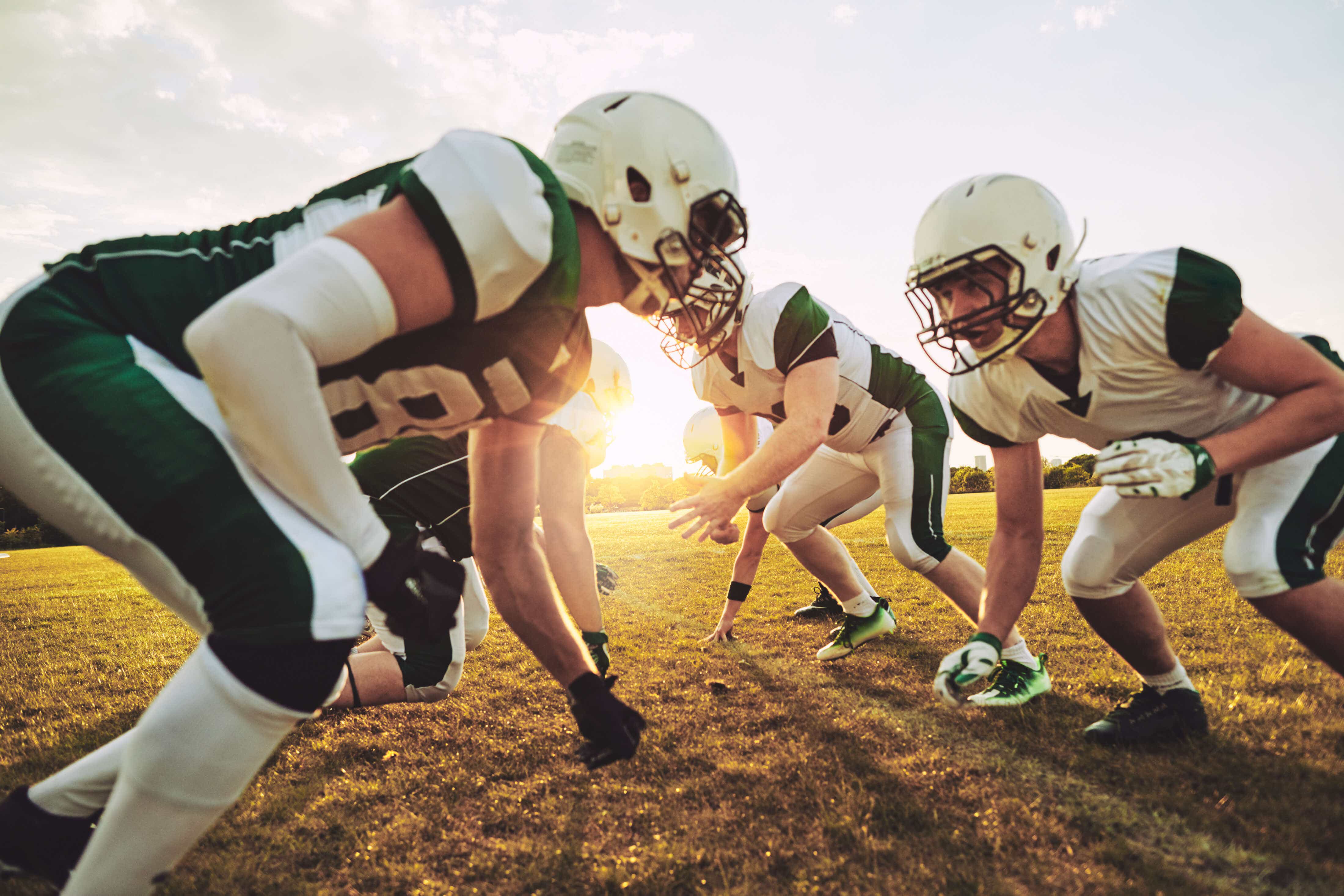 Football players on the field wearing all their football Gear