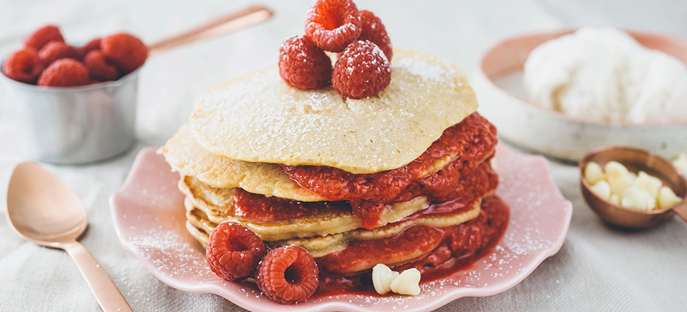 White chocolate pancakes with raspberry coulis White chocolate pancakes with raspberry coulis