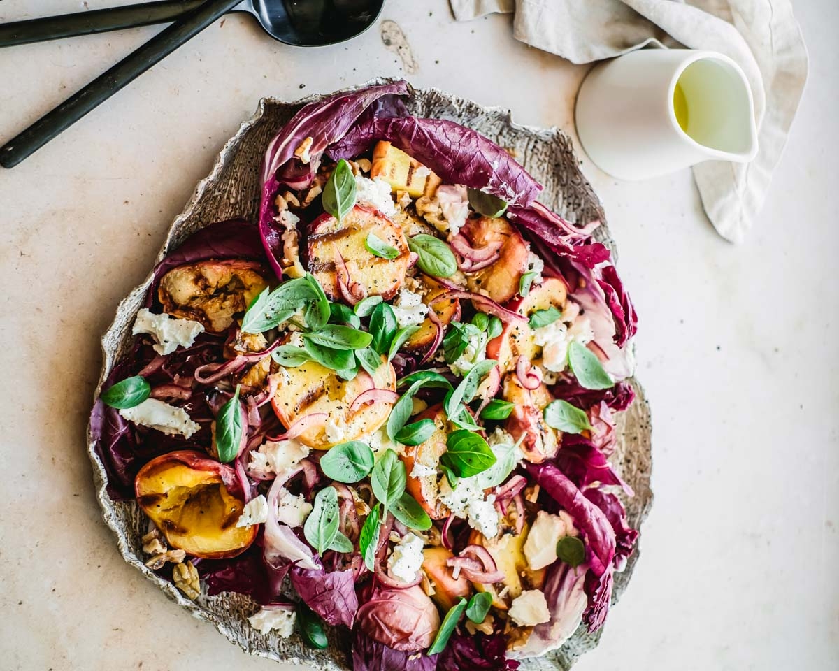 https://images.contentstack.io/v3/assets/blt9777ffe07a3470fa/blt2f7942da7f60a32e/673877f8580f087e34ef040c/Grilled-Peach-Image-1-(3).jpg