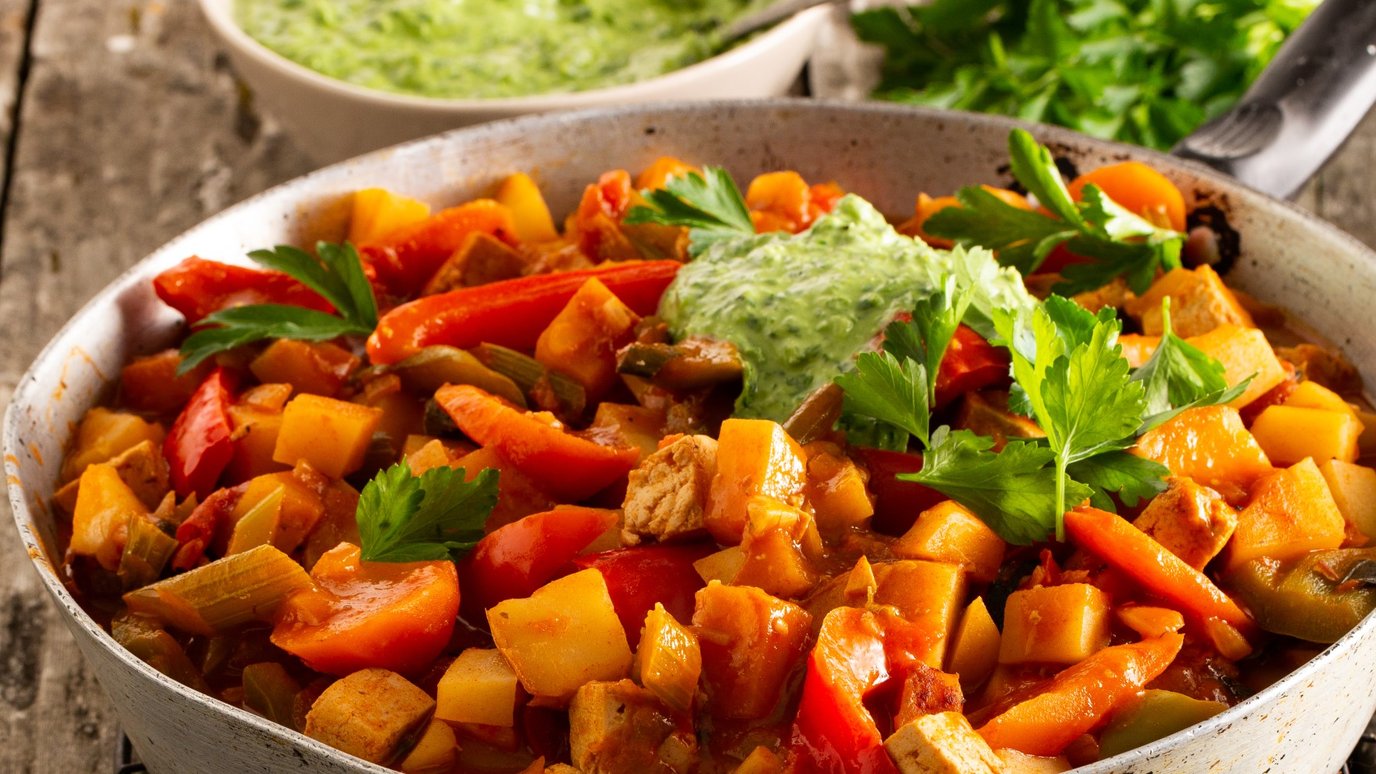 Vegetarian goulash with green goddess dressing