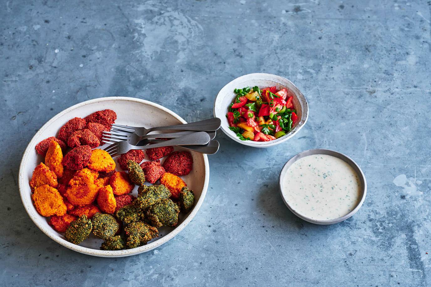 Rainbow falafels with parsley salad