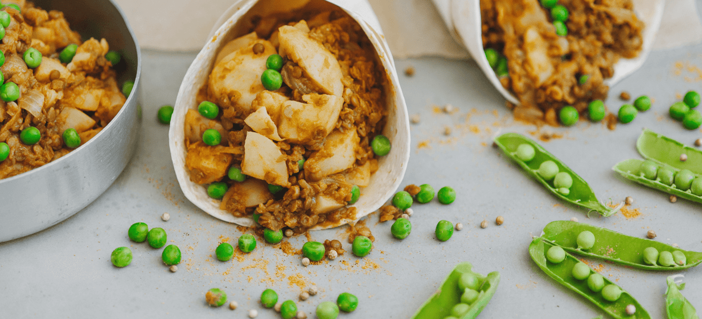 Potato and pea curry in roti cones