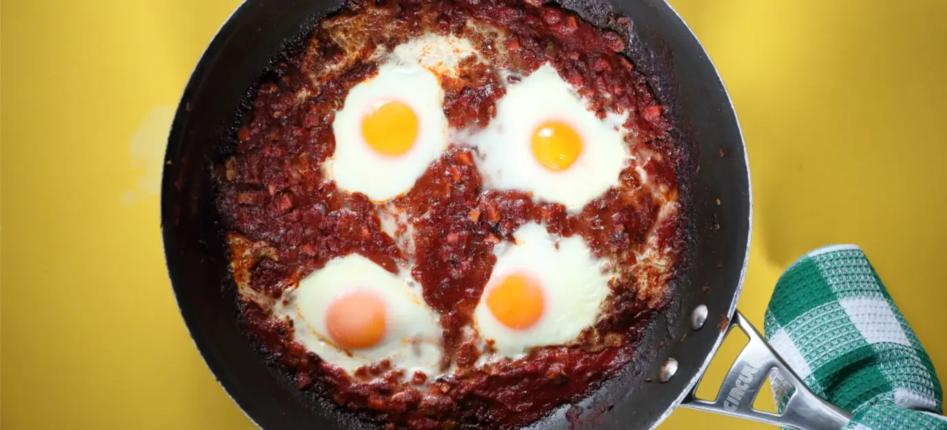 Baked eggs with cumin flatbread