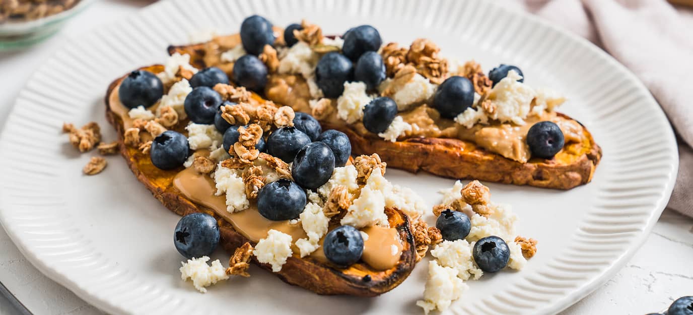 Sweet potato toast with peanut butter, ricotta & blueberries
