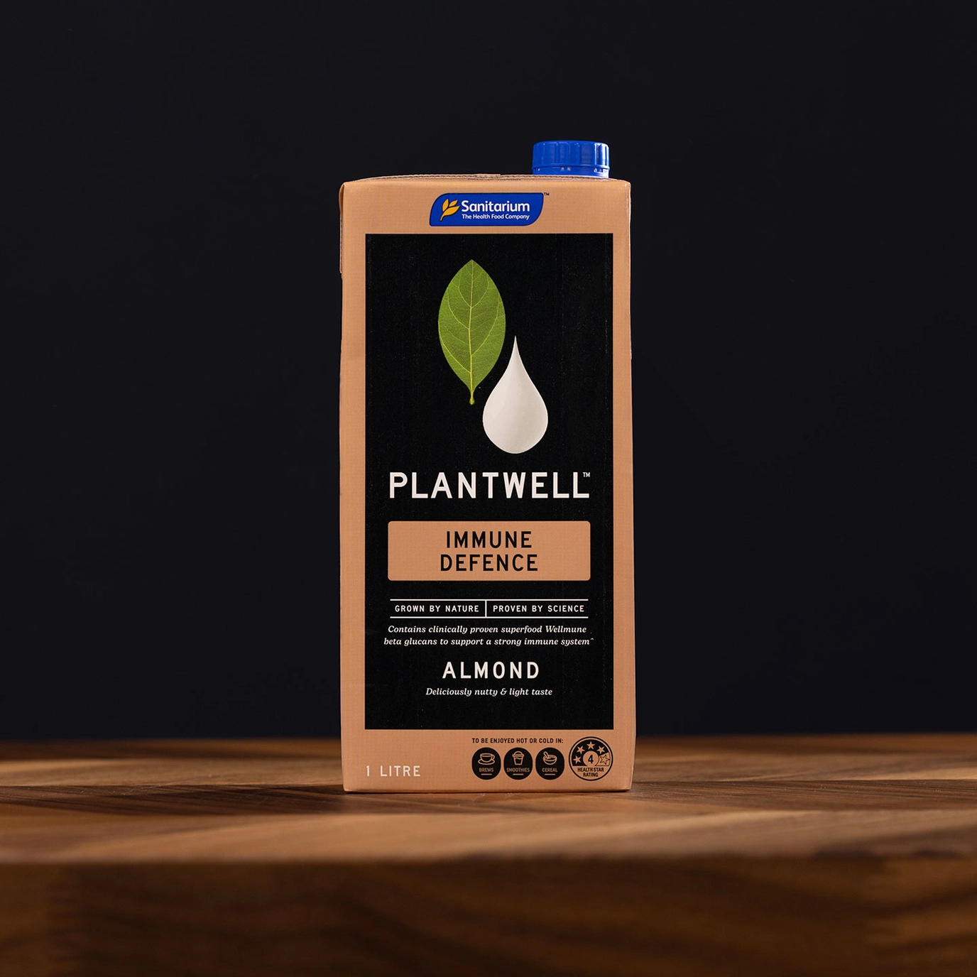 Plantwell Almond milk on table