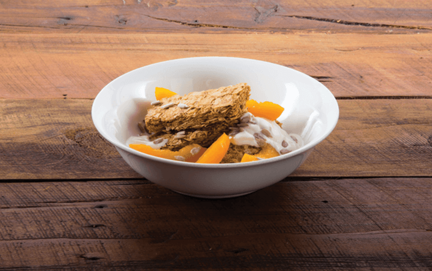 Weet-Bix™ with apricots, yoghurt and hazelnuts