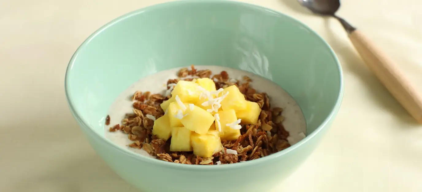 Tropical fruit with coconut crumble & cinnamon yoghurt