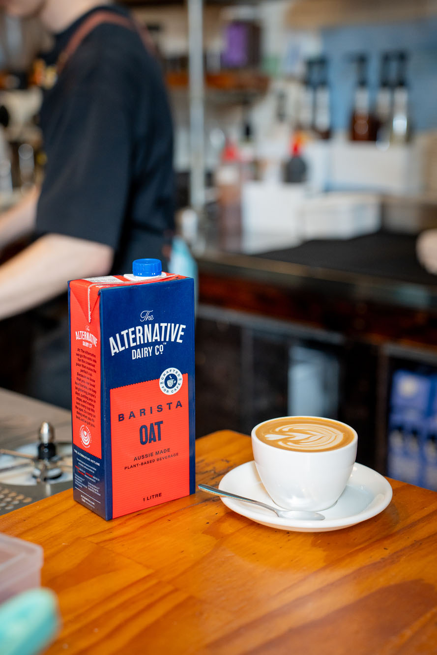 A close-up view of brewed coffee in a cup, styled for a blog or promotional post. The image has a warm, inviting tone suitable for coffee shop or café content.