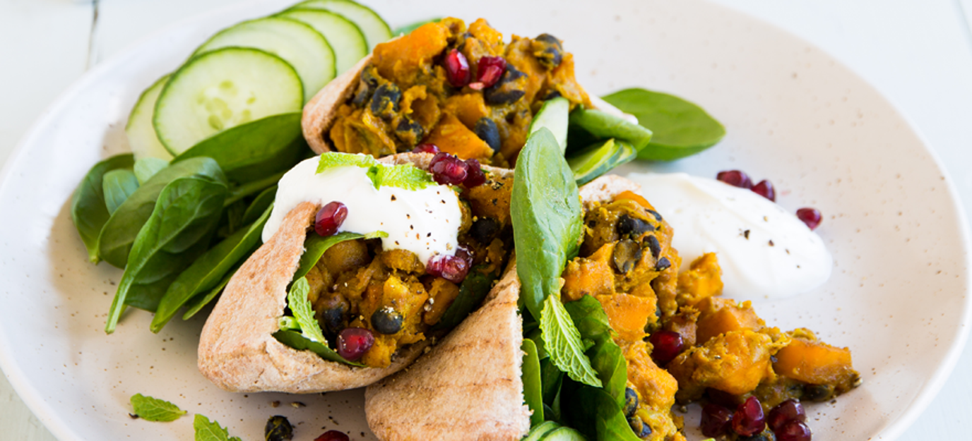 Curried squash & black bean pita pockets with cucumber & yoghurt sauce Curried squash & black bean pita pockets with cucumber & yoghurt sauce