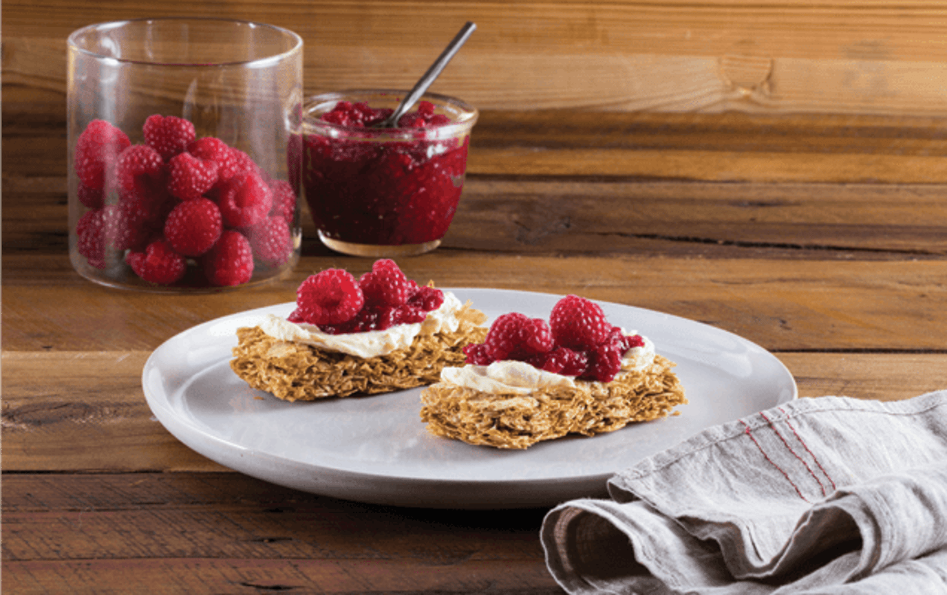 Raspberries and cream cheese on Weet-Bix™