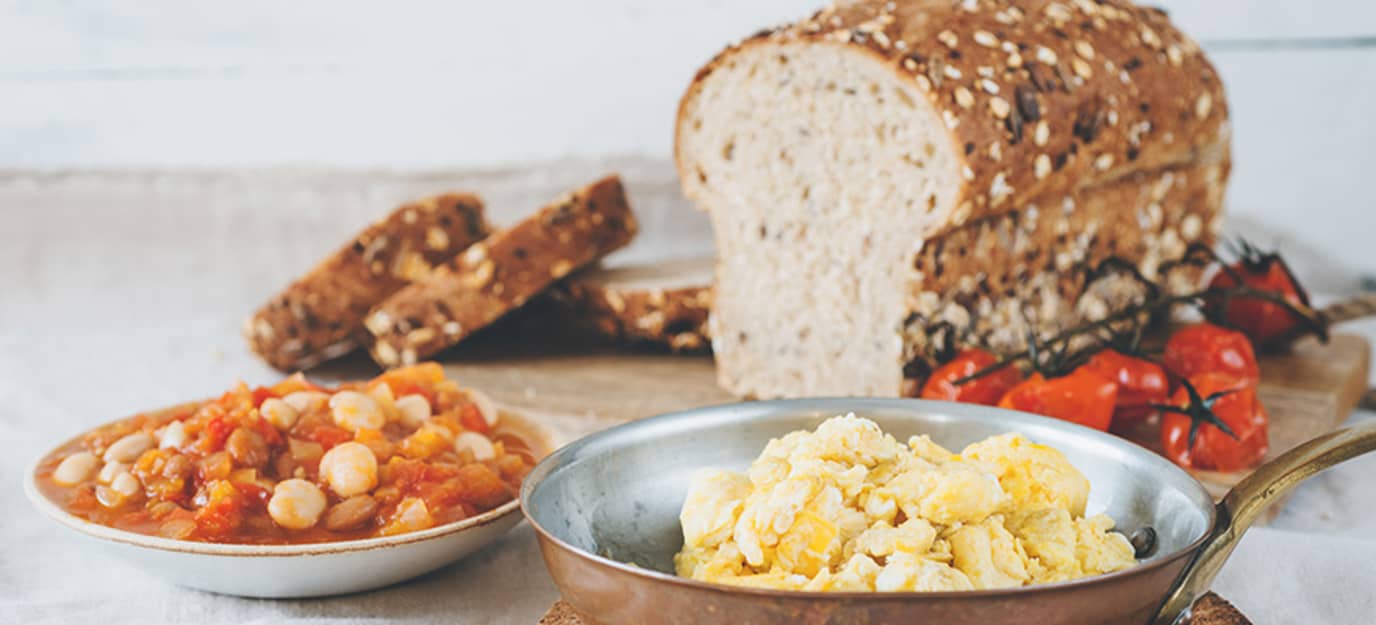 Scrambled eggs and breakfast beans
