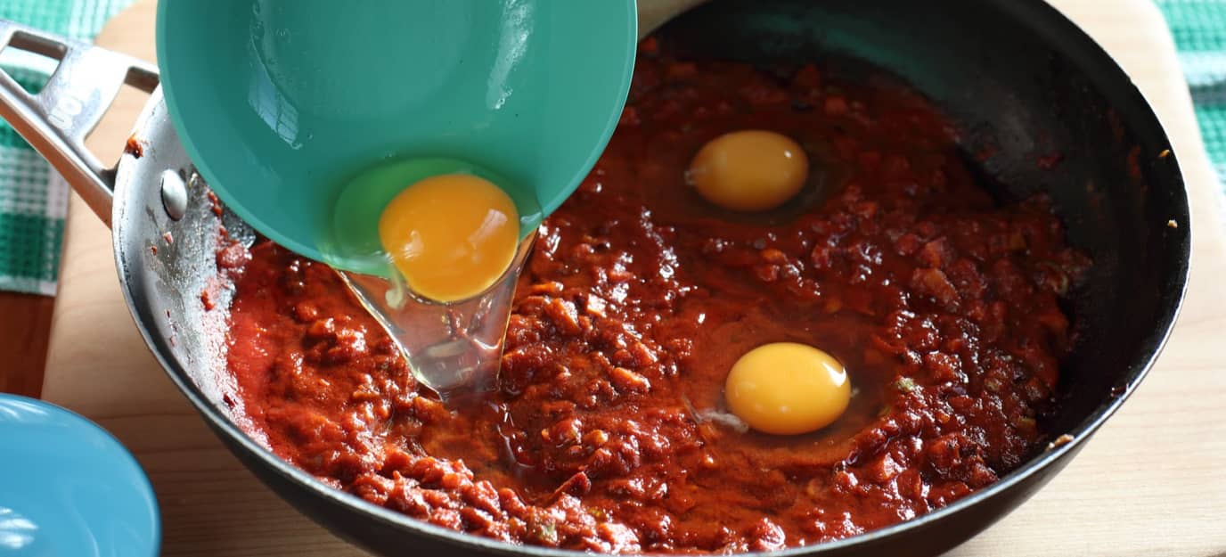 Baked eggs with cumin flatbread