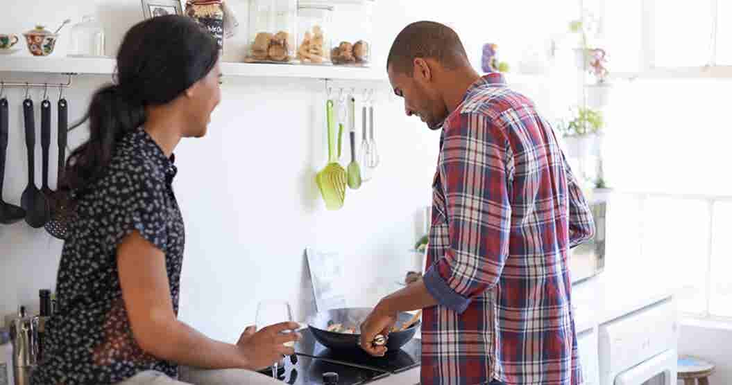 Husband cooking cheap and healthy food for wife