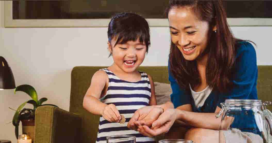 Mother playing with daughter