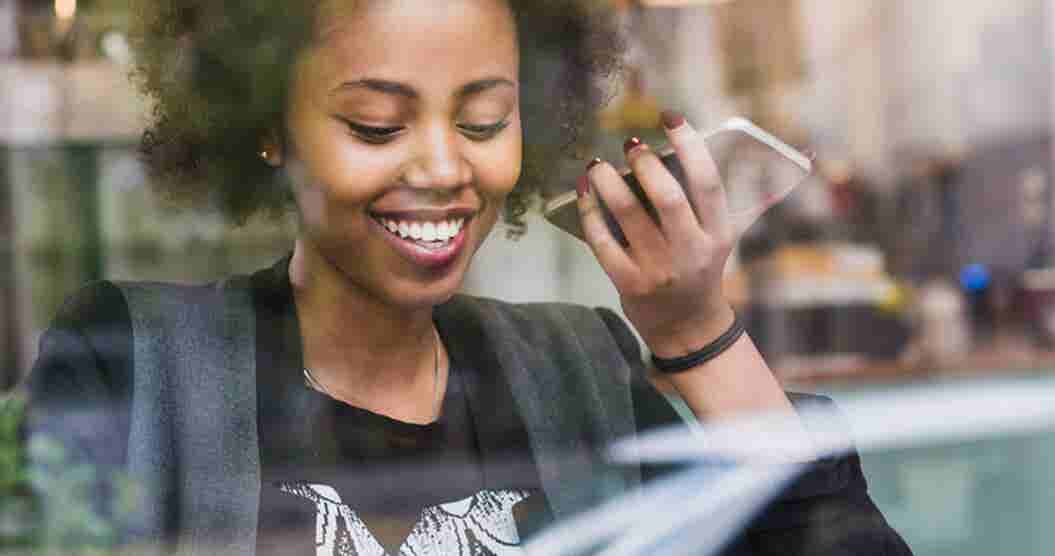 Woman researching cash loans on the internet on her smartphone