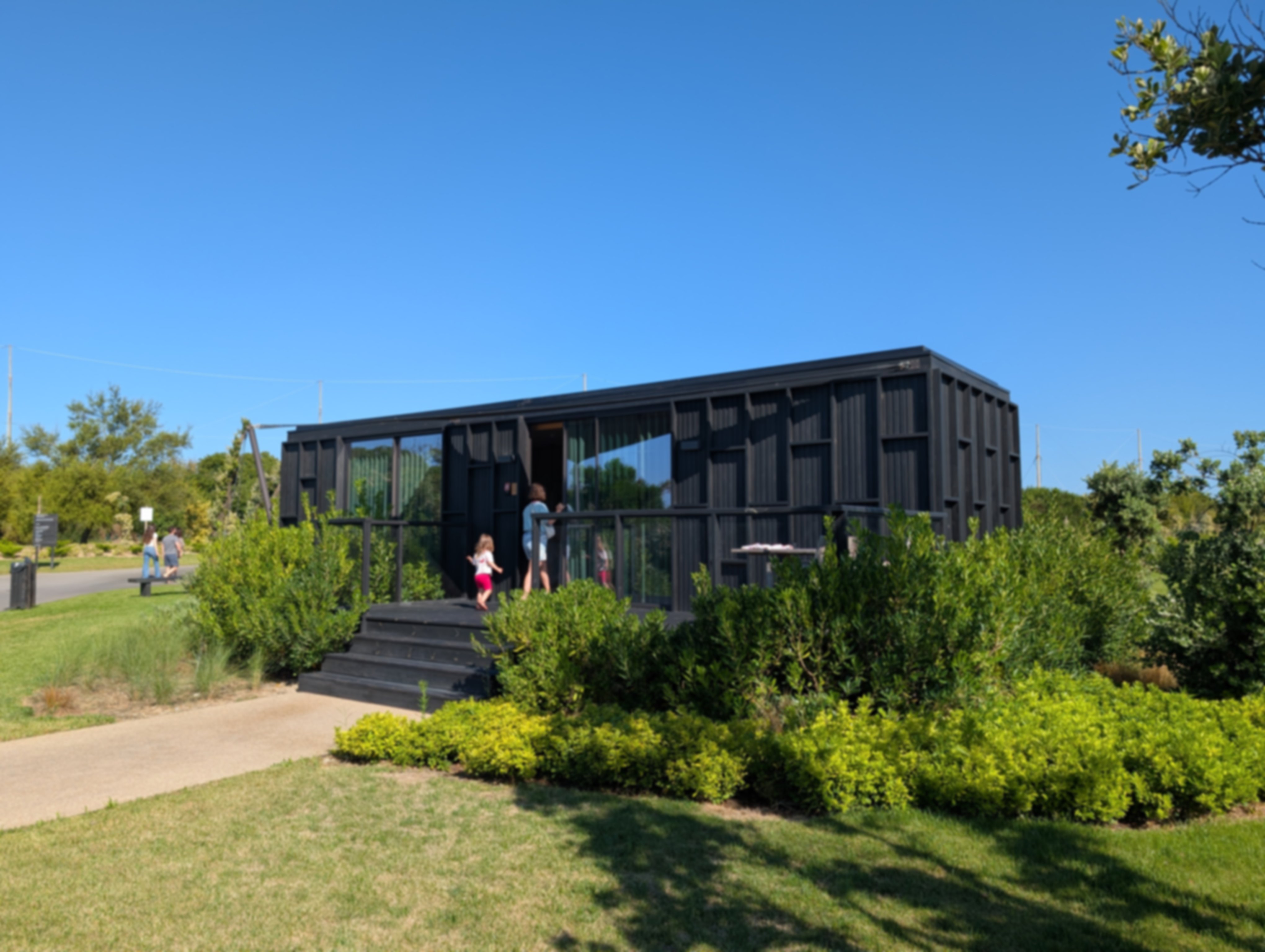 One of the lodges surrounded by grass at Tivoli Estela