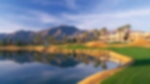 Water guarding the fairway to the left with mountains acting at the backdrop at La Quinta.