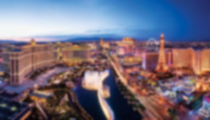 Aerial view of the skyline and city centre with all the lights on.