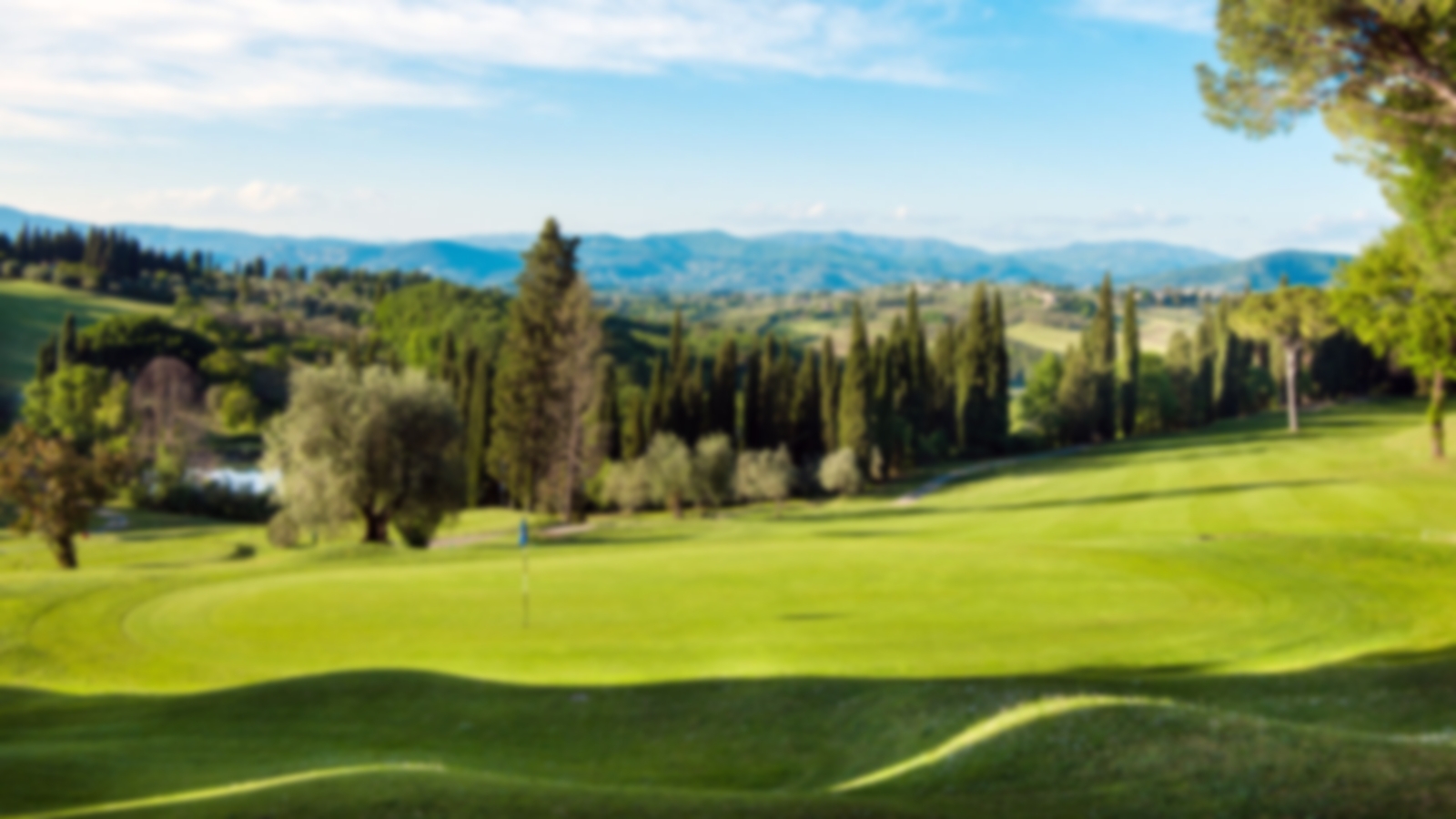 Scenic view of the surrounding mountains at Circolo Golf Ugolino.