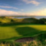 Green at Ballybunion surrounded by spectacular sand dunes.